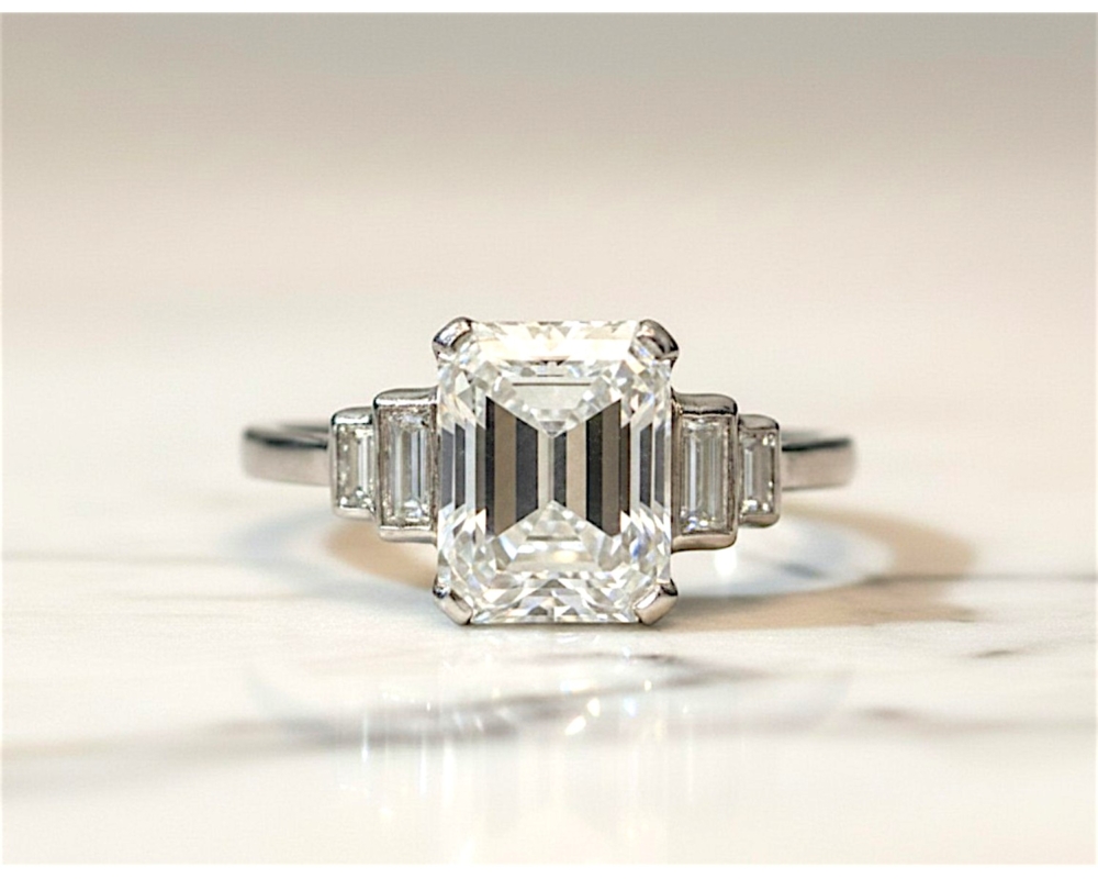 antique Art deco emerald cut diamond ring with 2.83ct stone and baguette cut diamond shoulders for sale in Leeds