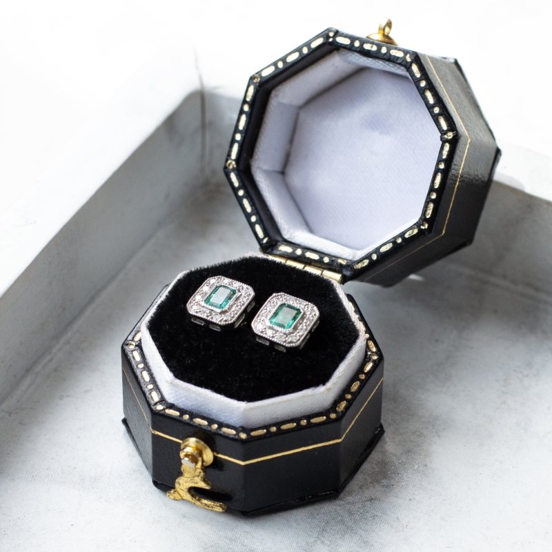 art deco style emerald and diamond stud earrings with matching ring and pendant also available.