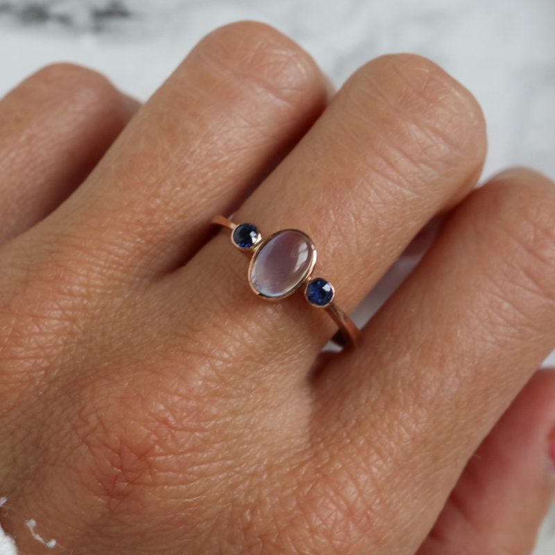 Contemporary sapphire and moonstone ring set in 9ct rose gold for sale in Leeds, Yorkshire