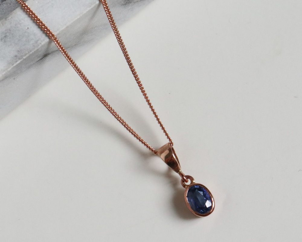 Modern 9ct rose gold and sapphire pendant necklace for sale
