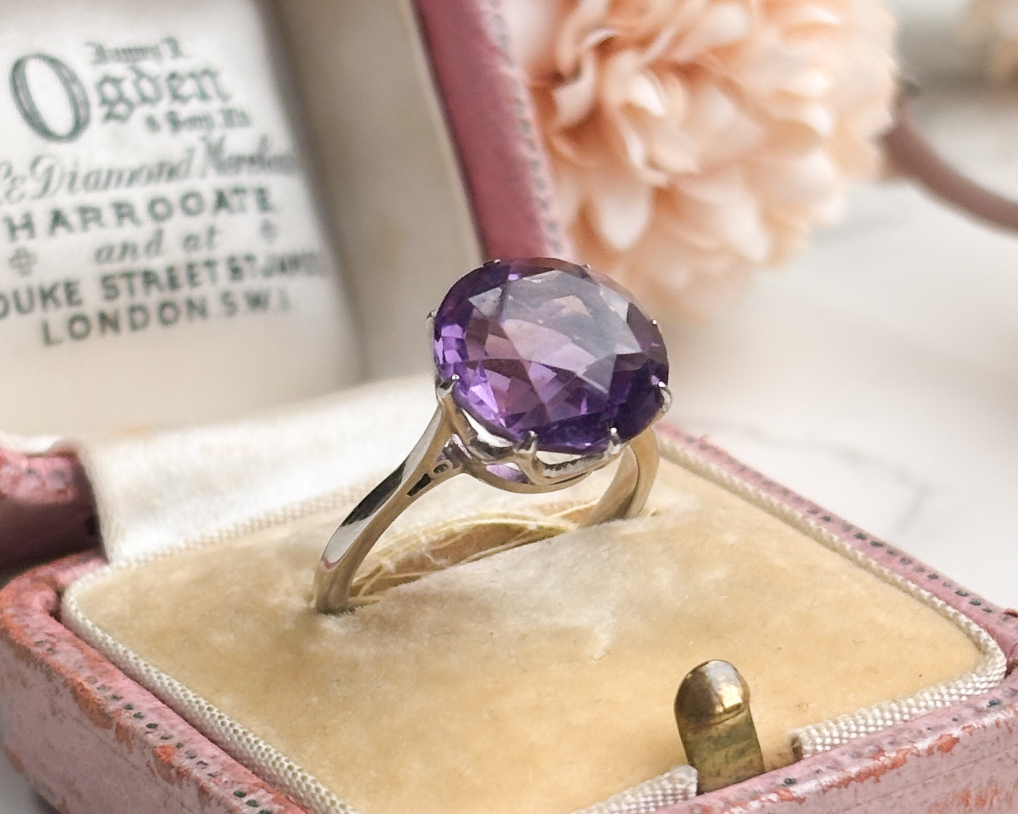 antique Art deco amethyst ring in 9ct white gold, shown in a pink old box