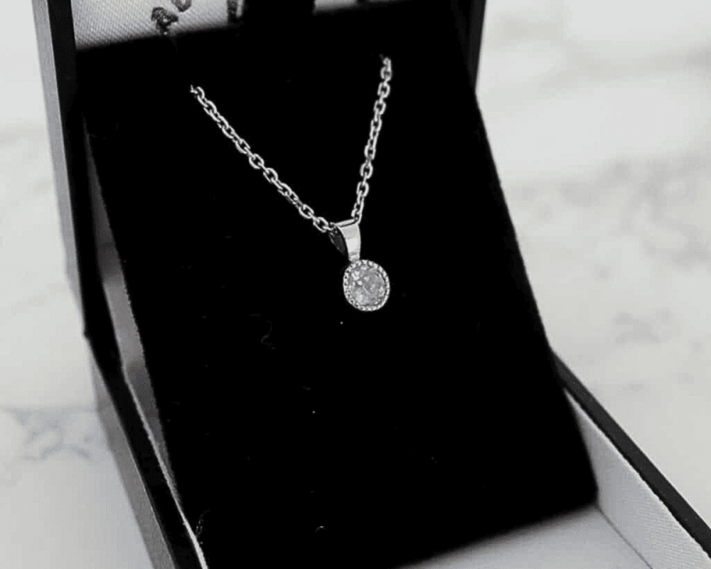 old cut diamond pendant in white gold bezel setting on white gold chain for sale in Leeds, Yorkshire in presentation box