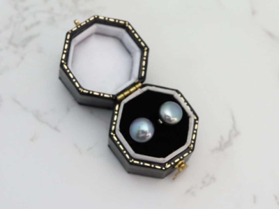 silver and black pearl studs in box