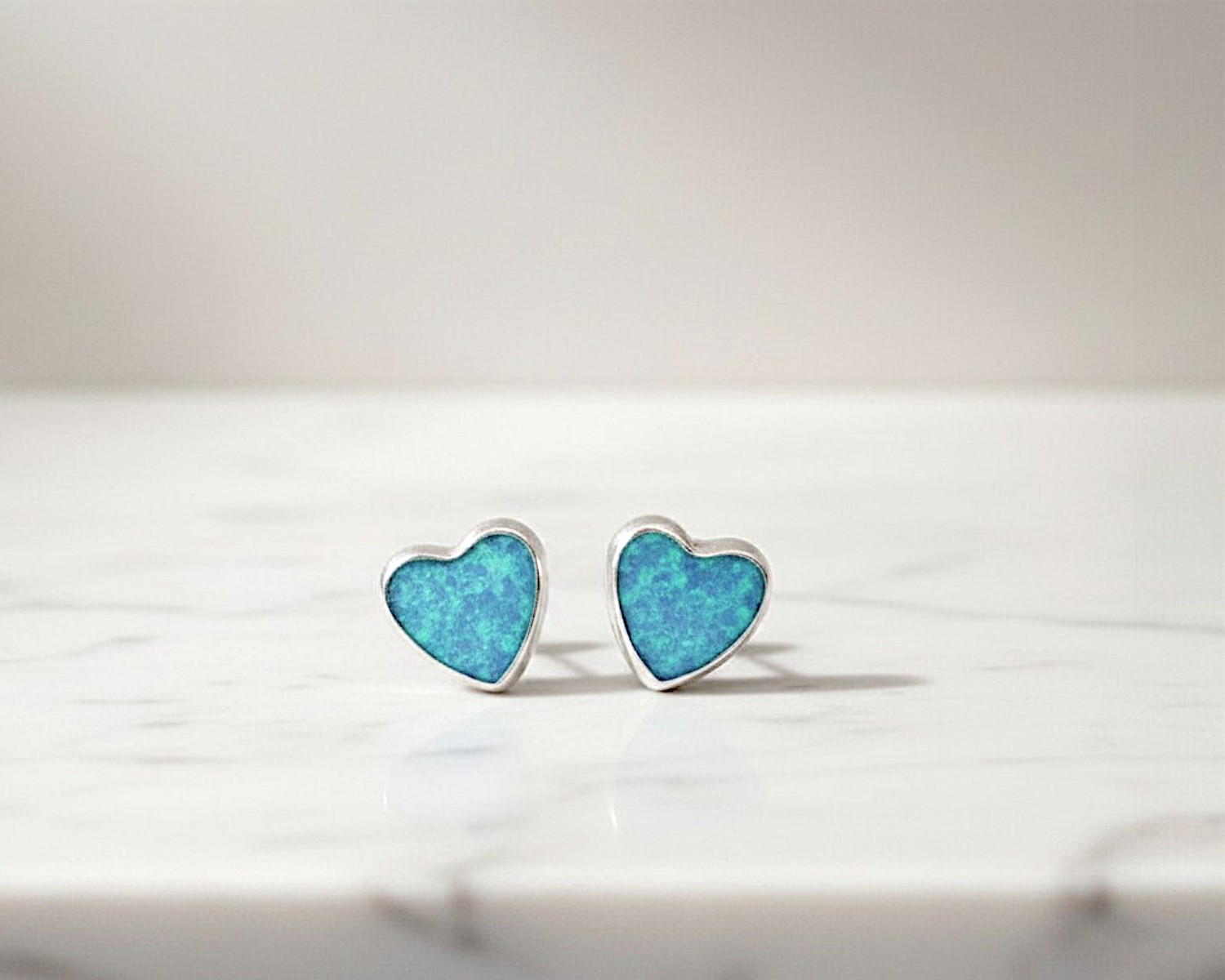 silver and light blue heart shaped opal studs for sale in Leeds