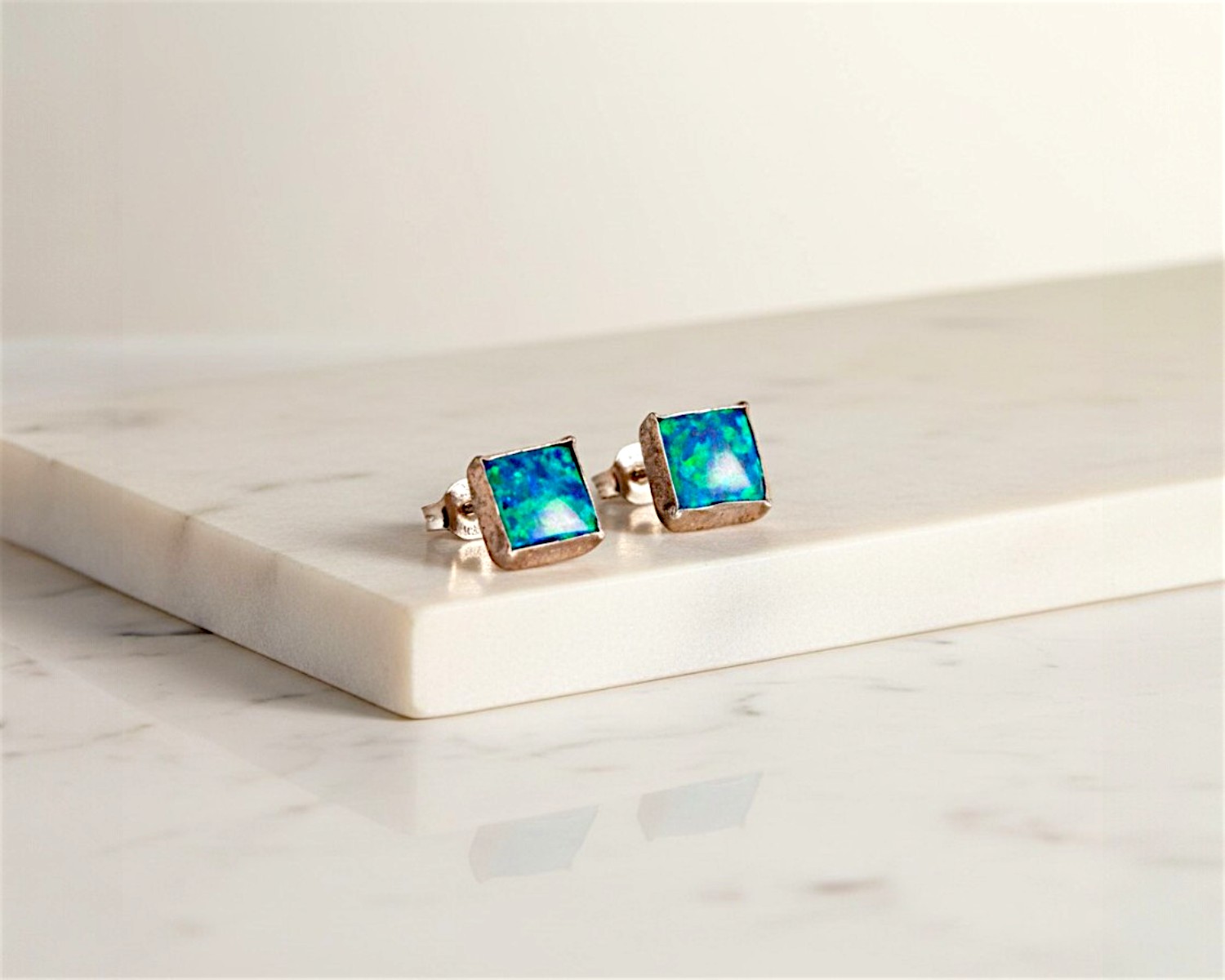 dark blue square opal studs