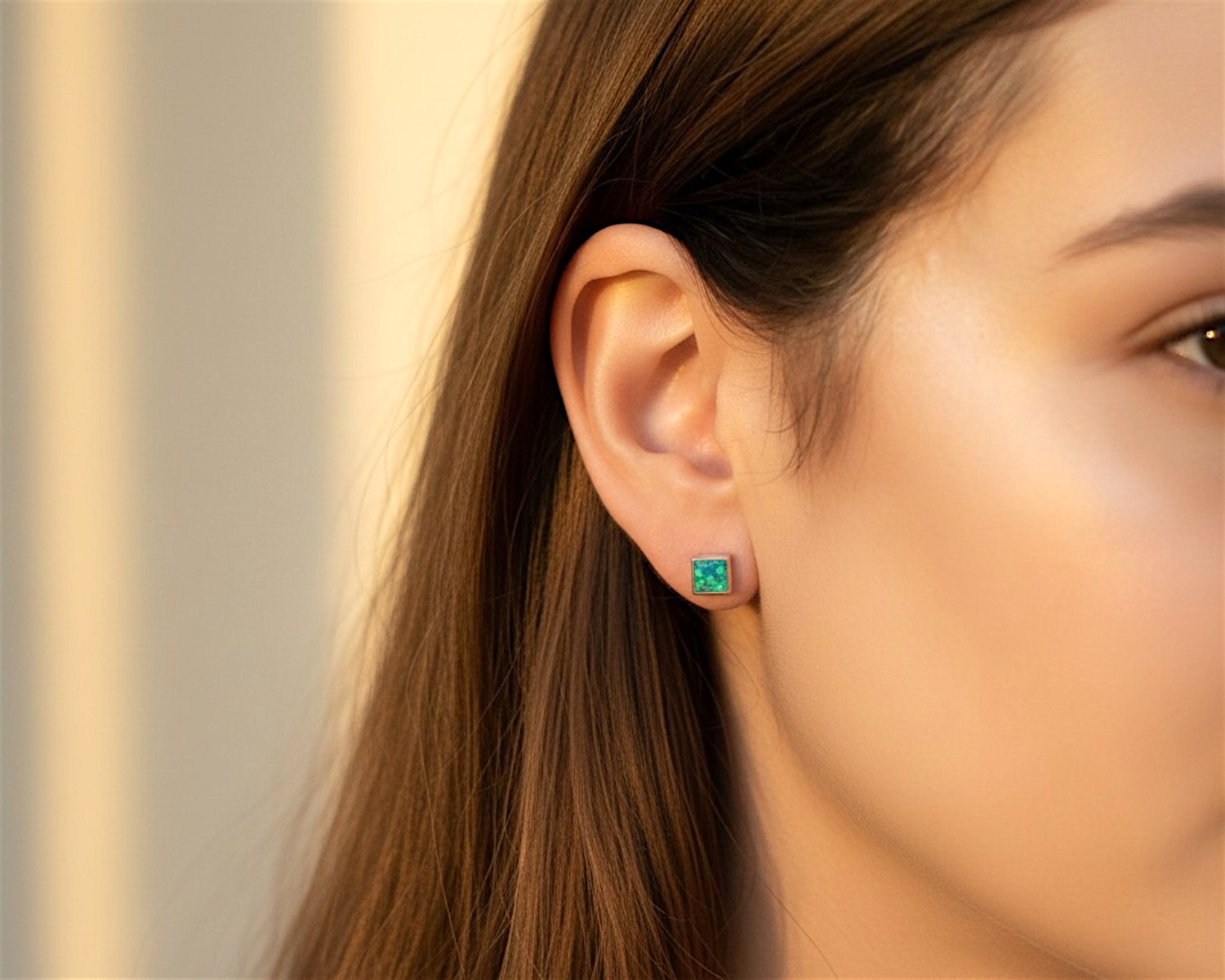 dark blue studs on model