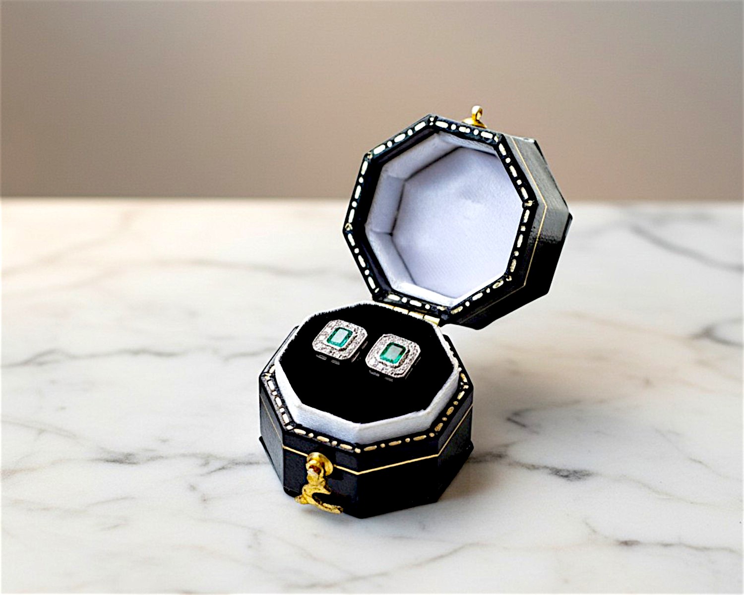 emerald studs in box