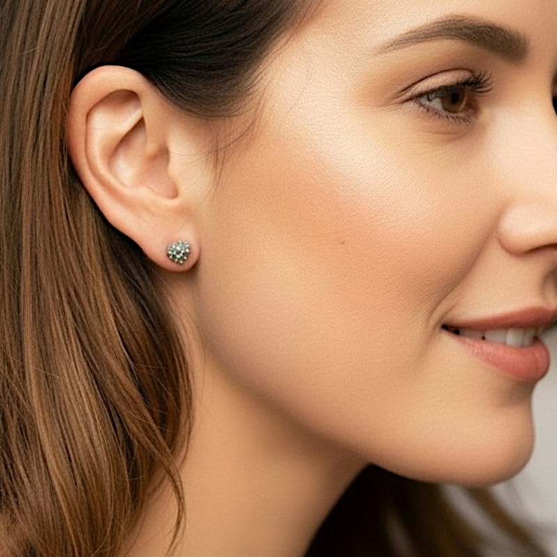 vintage style silver marcasite heart studs for pierced ears shown in model's ear