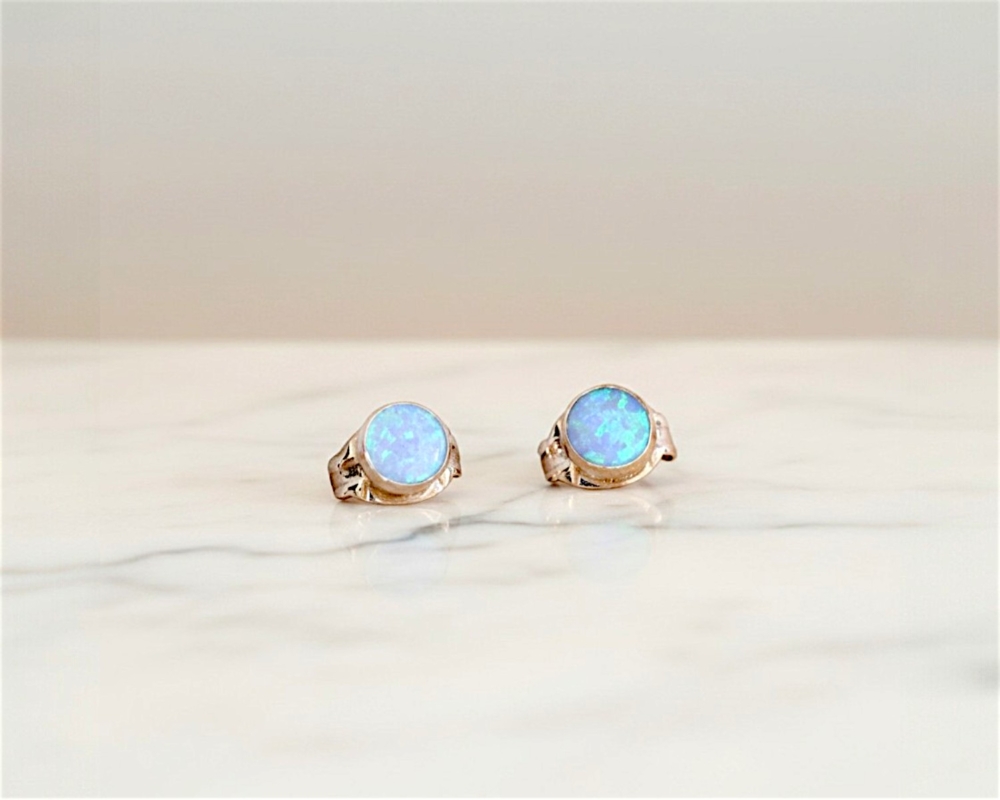 small round opal studs in blue for sale