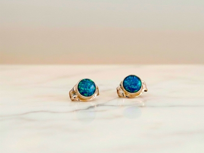 small round opal studs in dark blue for sale