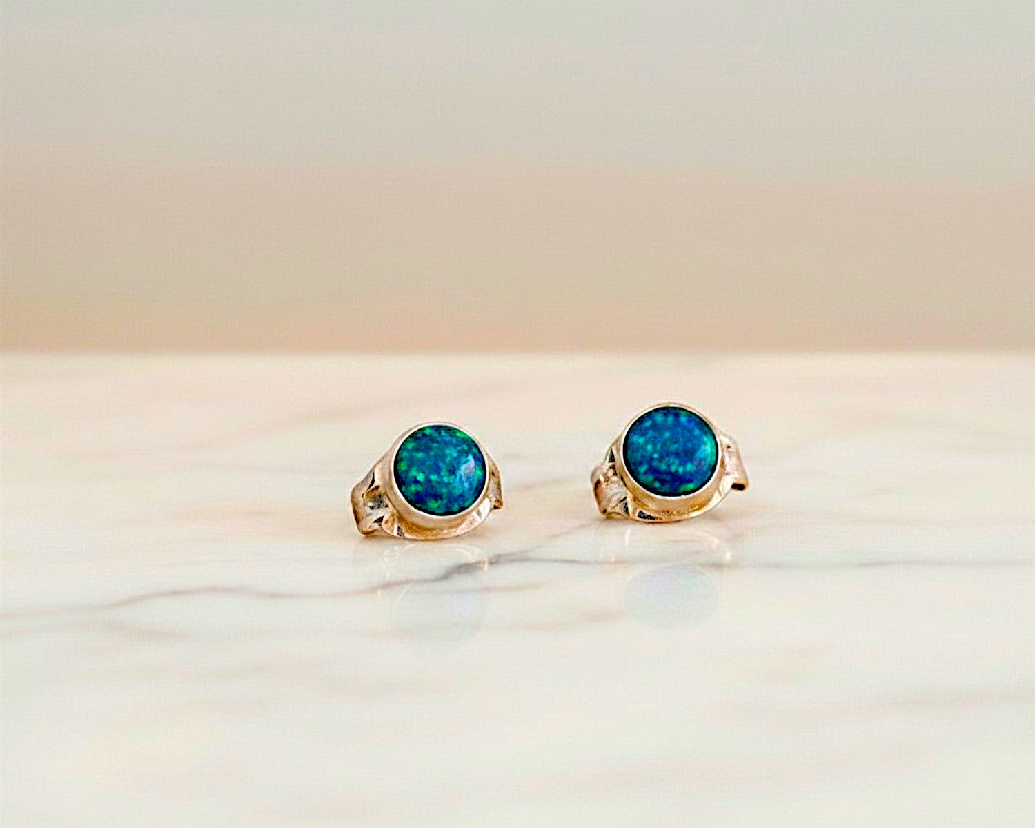 small dark opal blue studs