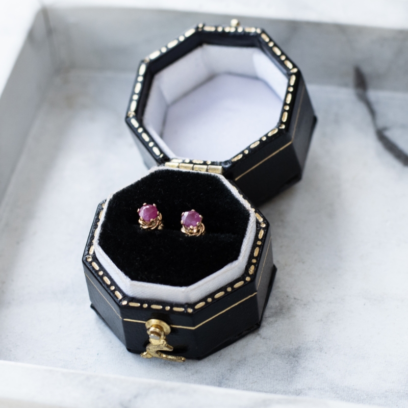 a pair of modern 9ct gold and ruby stud earrings for pierced ears, claw set in a presentation box