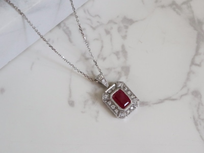 art deco style ruby and diamond pendant on a 9ct white gold chain for sale in Leeds