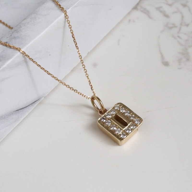 vintage 9ct gold initial pendant set with diamonds on a 16 inch chain for sale in Leeds