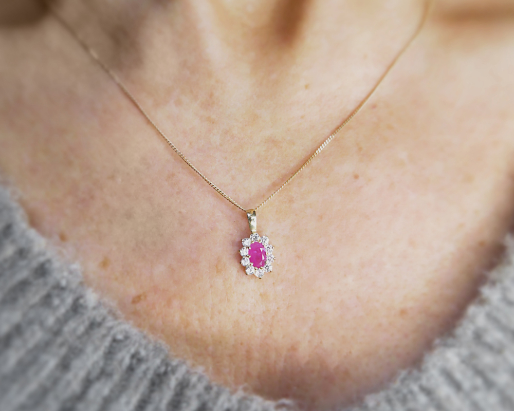 modern ruby cluster pendant with CZ in 9ct yellow gold for sale on woman's neck