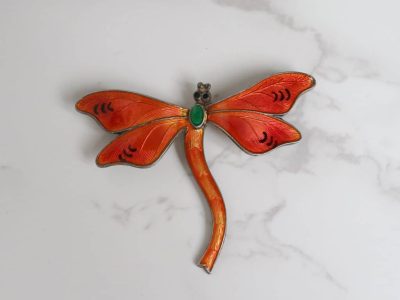 antique dragonfly brooch made from silver and orange enamel in the Edwardian era for sale in Leeds