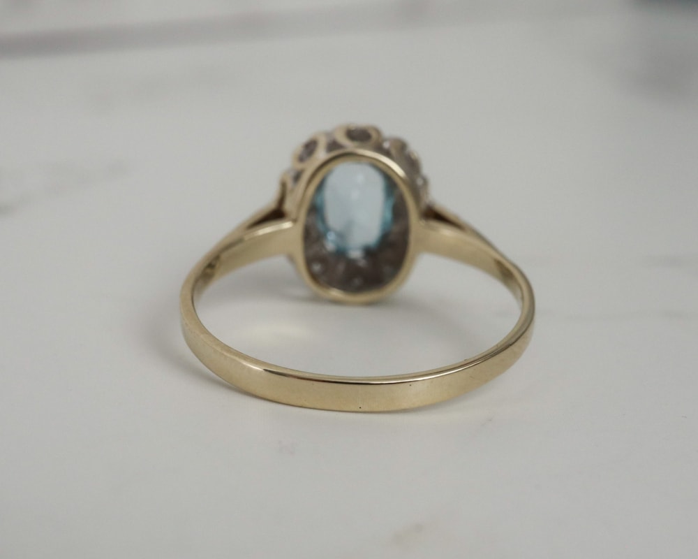 vintage blue topaz and diamond ring set in 9ct yellow gold for sale in Leeds
