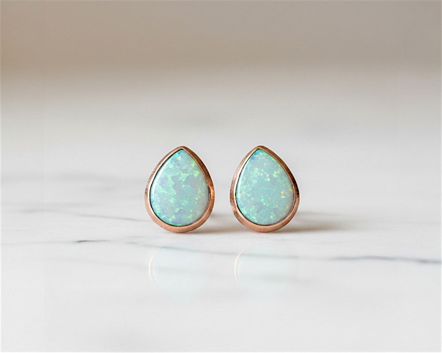 pear cut opal studs