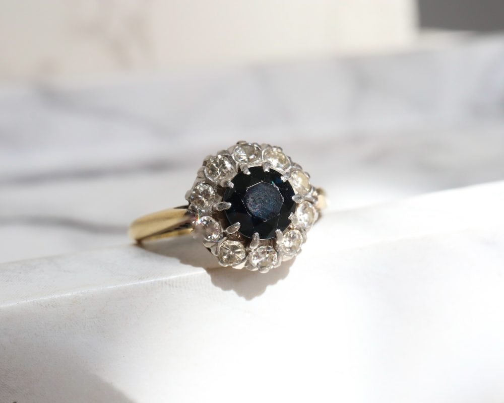 antique 1940s sapphire and diamond cluster ring in 18ct yellow gold and platinum for sale in Leeds