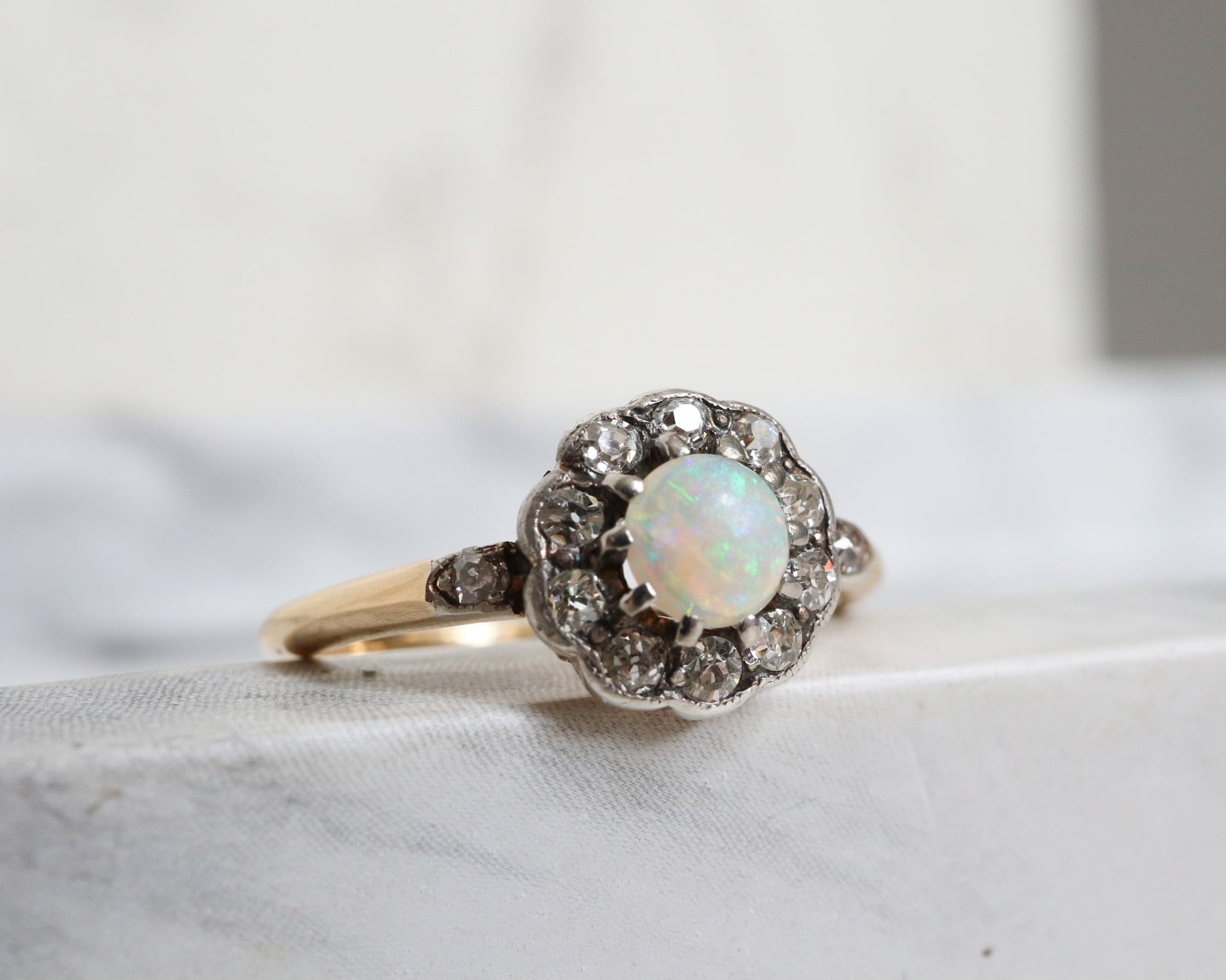 antique opal and diamond cluster ring circa 1920s