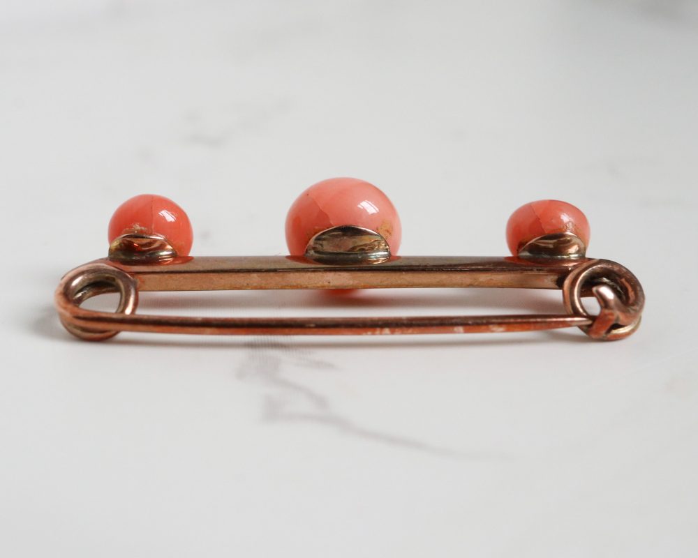 antique Victorian coral brooch in 9ct gold.