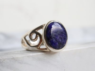 Silver and sapphire modern ring with cut out shank