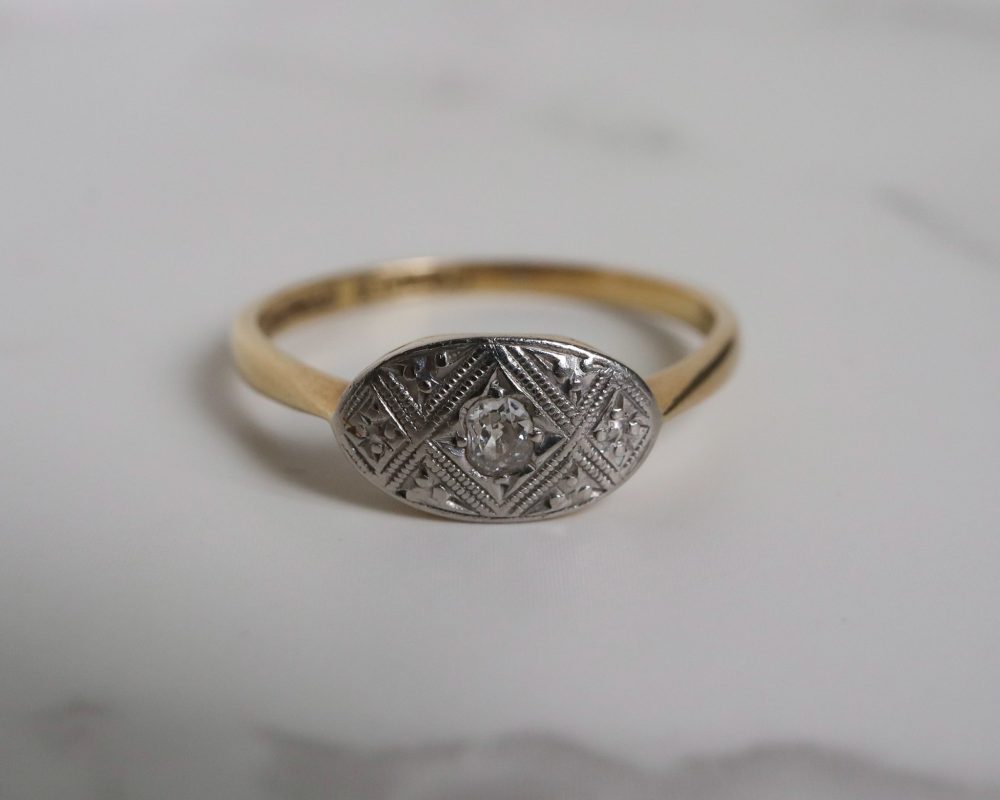 Antique Art Deco diamond ring with illusion setting 18ct yellow gold and platinum.