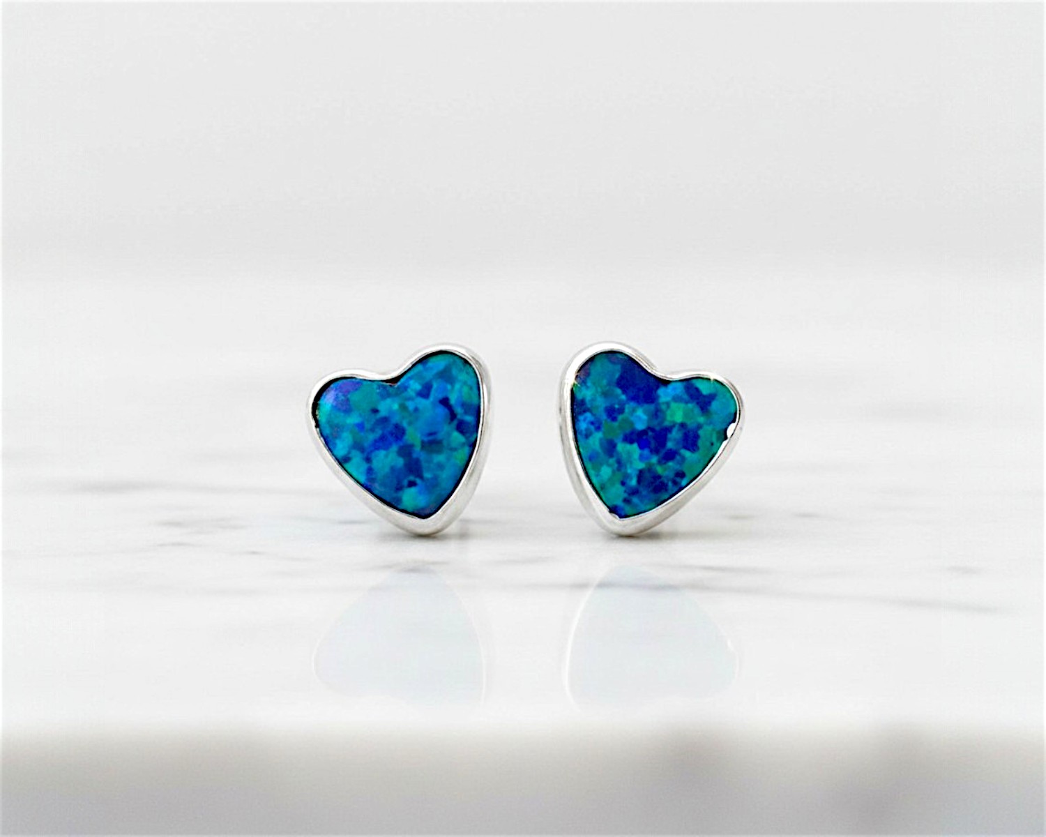silver and dark blue heart shaped opal studs for sale