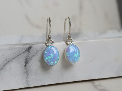 Silver and oval opal drop earrings for sale