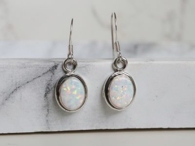Silver and oval opal drop earrings for sale