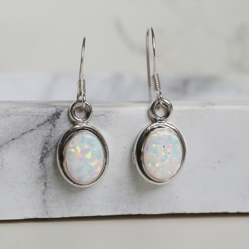 Silver and oval opal drop earrings for sale