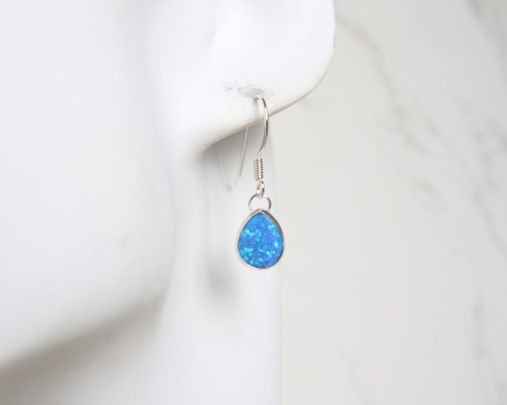 Silver and oval opal drop earrings for sale