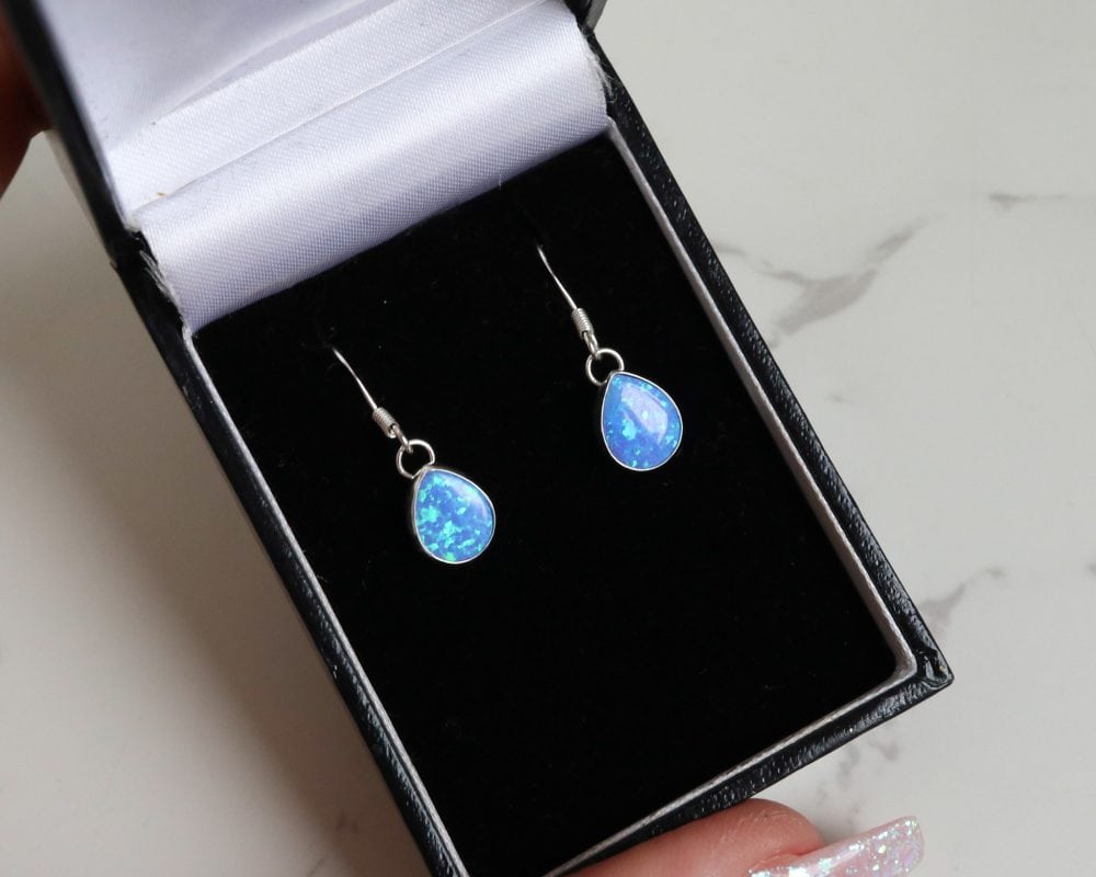 Silver and oval opal drop earrings for sale