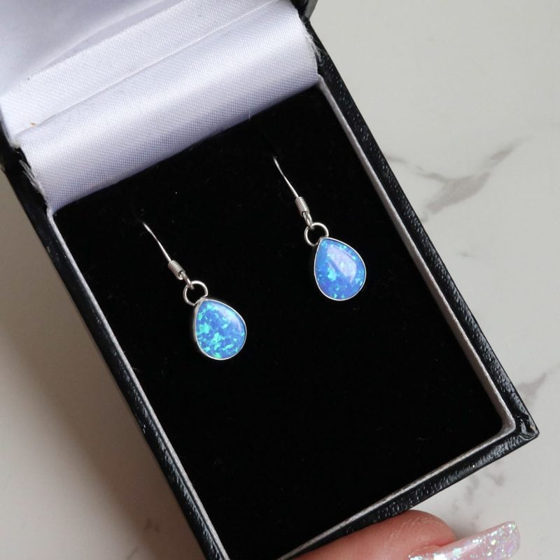 Silver and oval opal drop earrings for sale