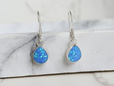 Silver and oval opal drop earrings for sale