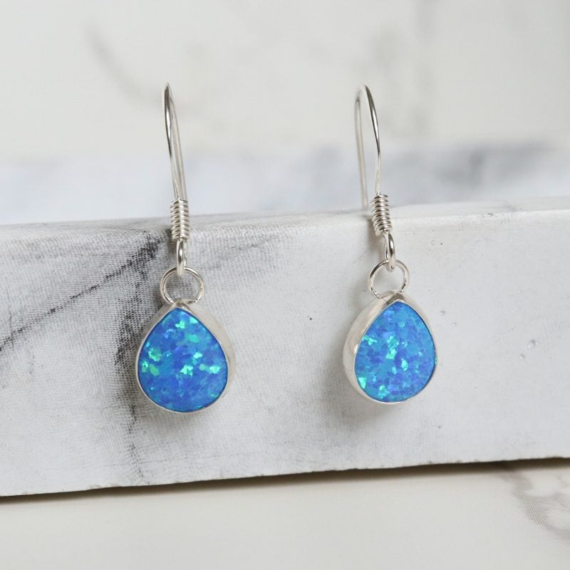 Silver and oval opal drop earrings for sale