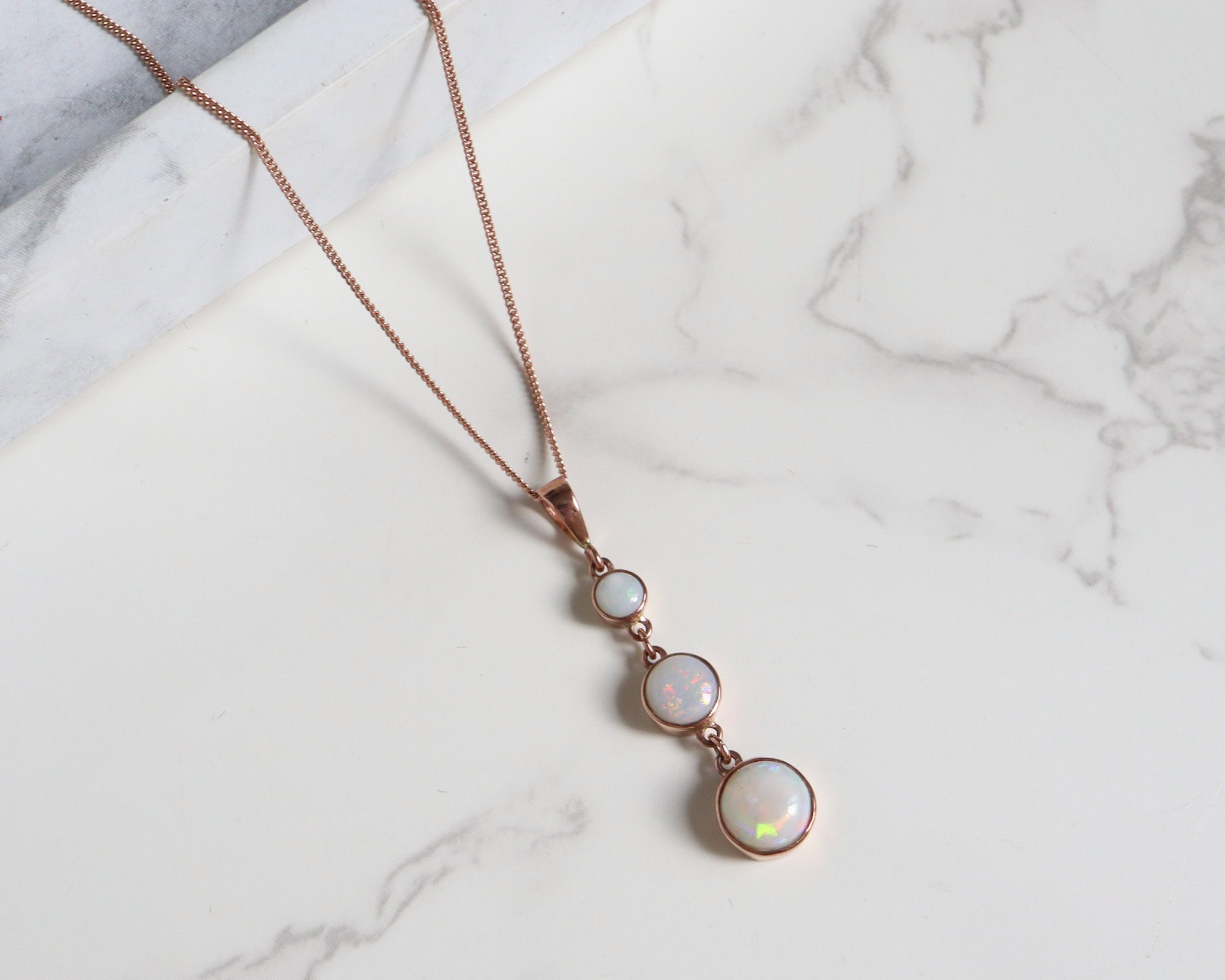 Modern 9ct rose gold opal pendant necklace on an 18 inch rose gold chain