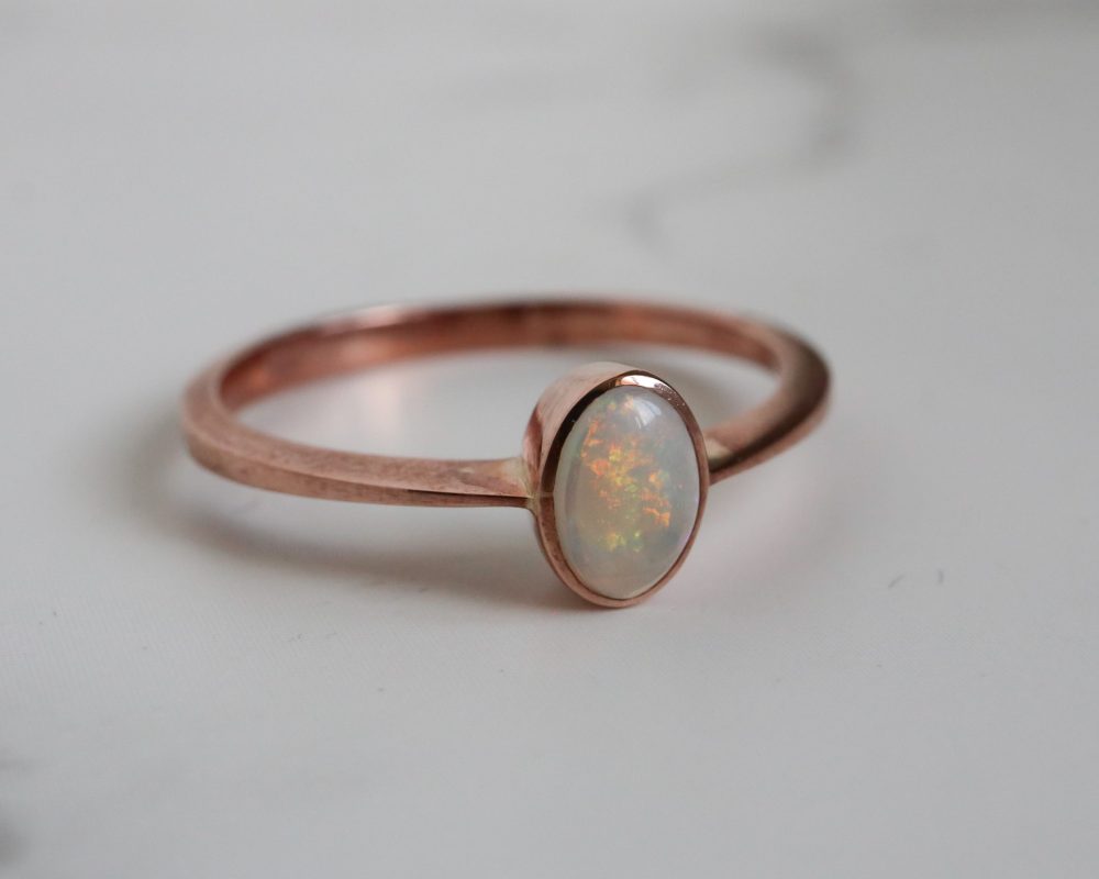 Modern 9ct rose gold and opal ring for sale in Leeds, Yorkshire