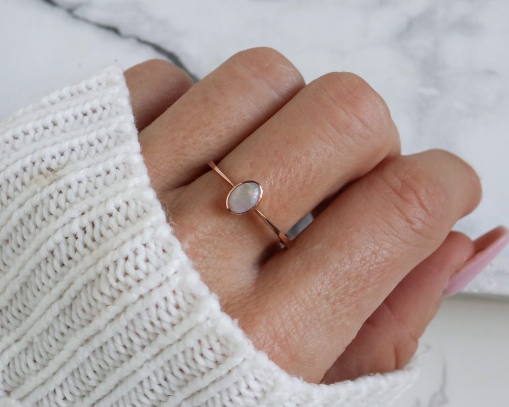Modern 9ct rose gold and opal ring for sale in Leeds, Yorkshire