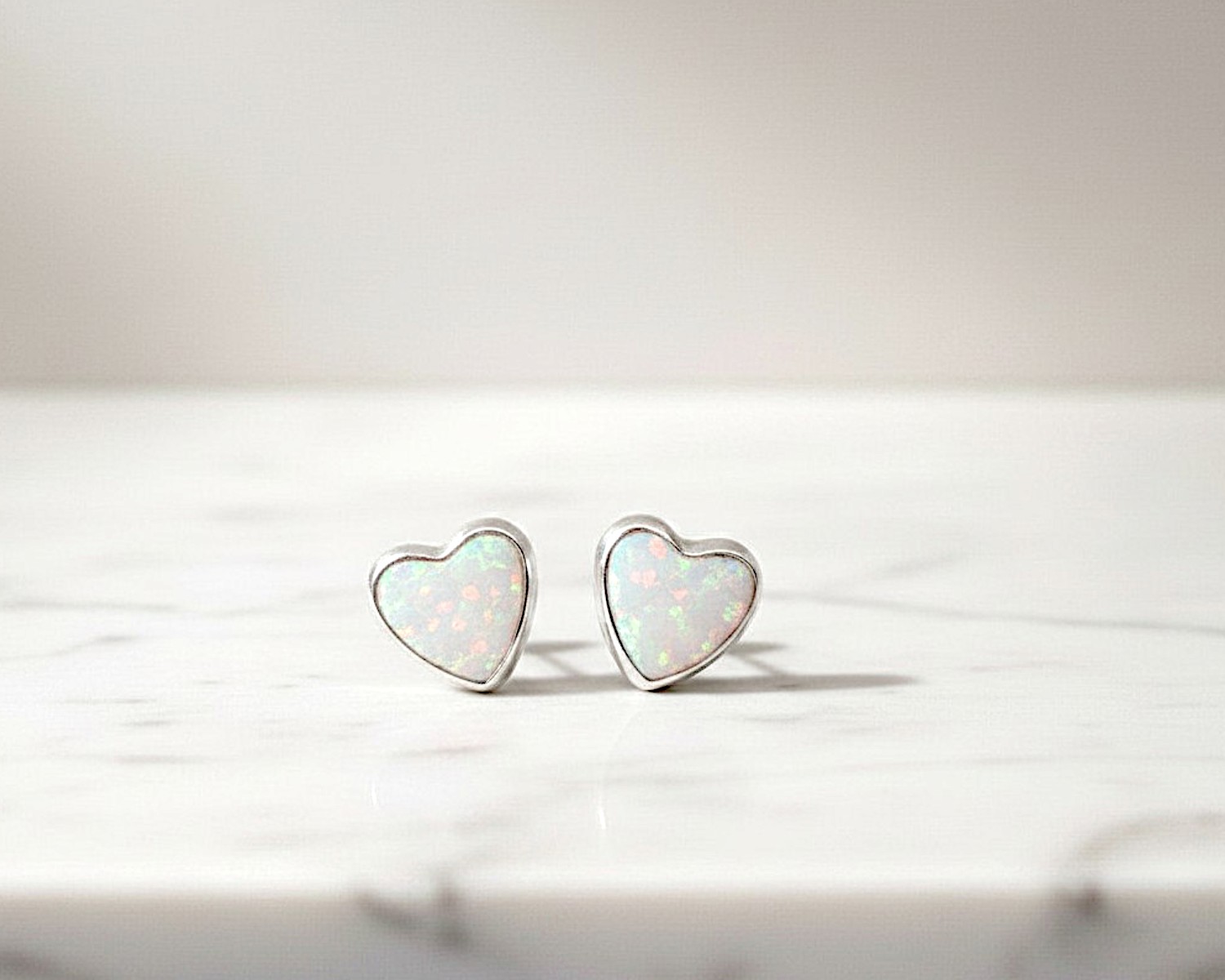 white opal heart studs