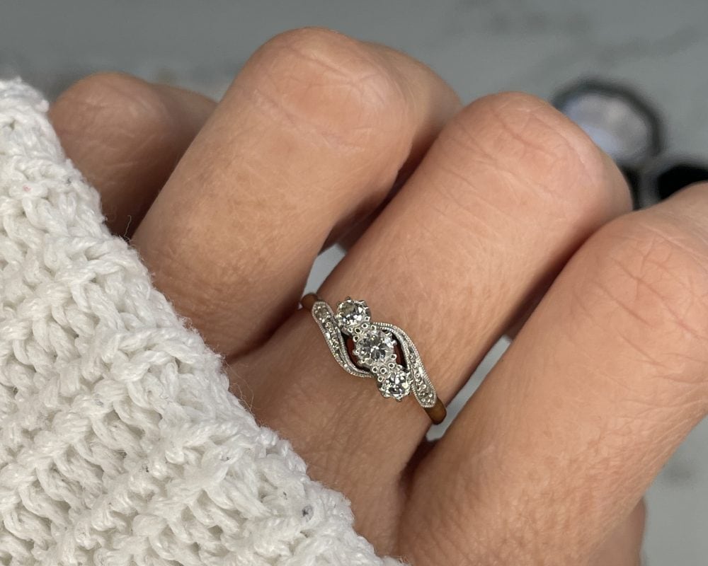 Antique Art Deco diamond three stone twist ring in 18ct yellow gold and platinum for sale in Leeds, Yorkshire