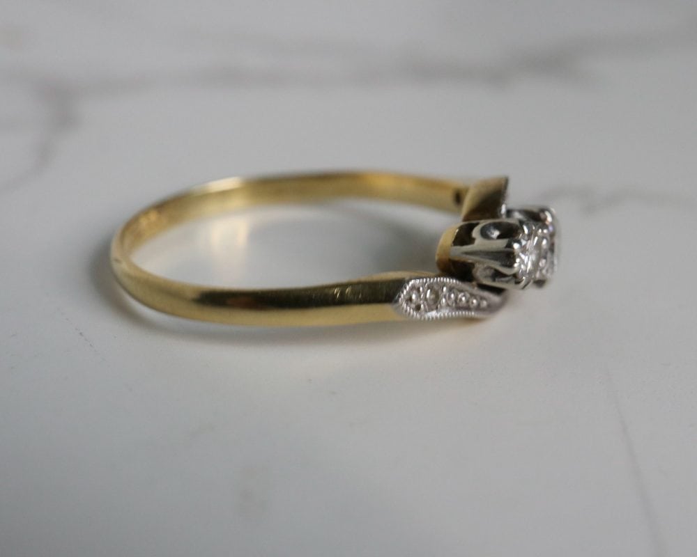 Antique Art Deco diamond three stone twist ring in 18ct yellow gold and platinum for sale in Leeds, Yorkshire