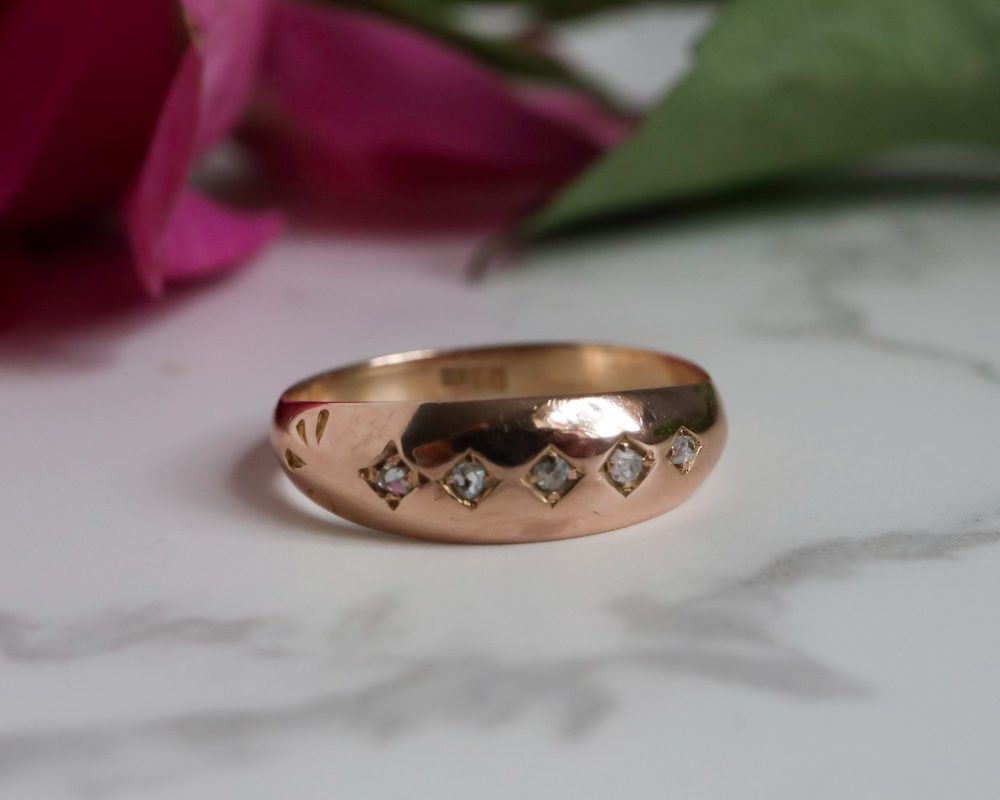 Antique 15ct gold and diamond gypsy ring made during the Victorian era.
