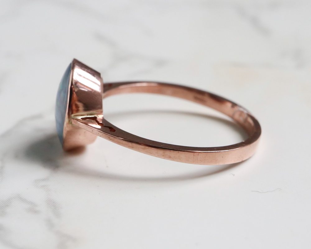 Modern opal ring set in 9ct rose gold for sale in Leeds, Yorkshire