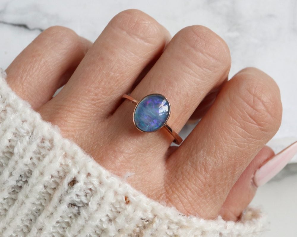 Modern opal ring set in 9ct rose gold for sale in Leeds, Yorkshire