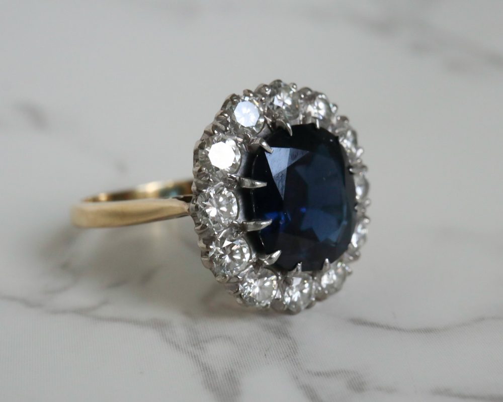 1940s sapphire and diamond cluster ring set in platinum and 18ct yellow gold for sale in Leeds, Yorkshire