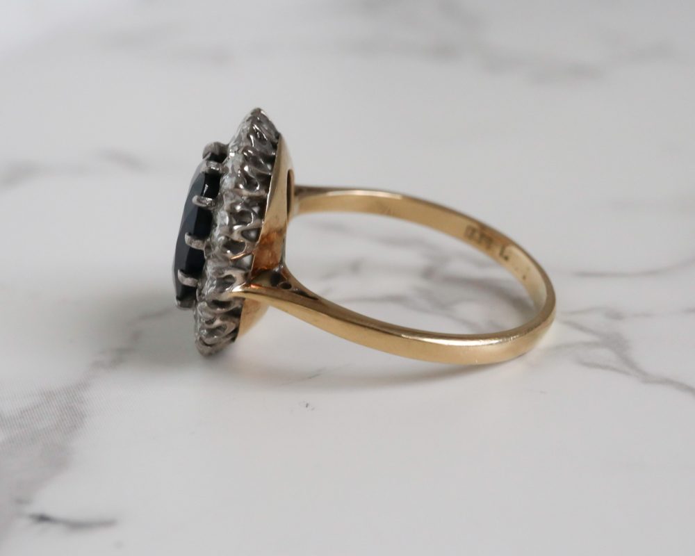 1940s sapphire and diamond cluster ring set in platinum and 18ct yellow gold for sale in Leeds, Yorkshire
