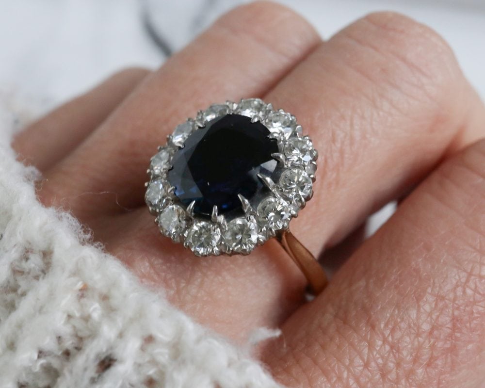 1940s sapphire and diamond cluster ring set in platinum and 18ct yellow gold for sale in Leeds, Yorkshire