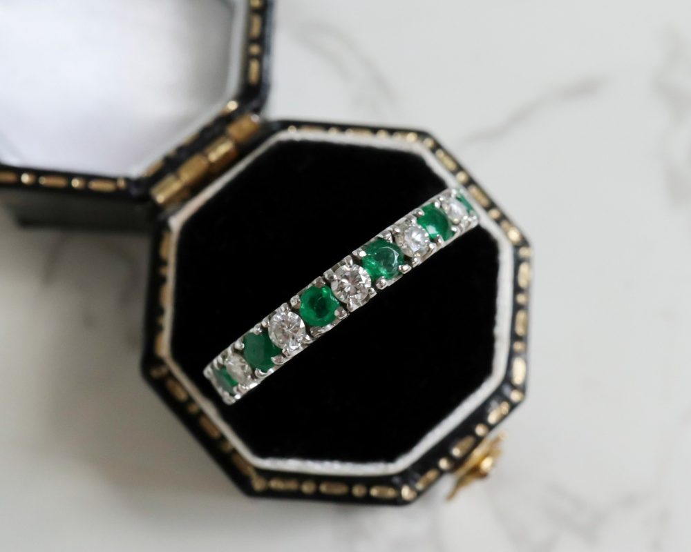 Antique emerald and diamond full eternity ring circa 1930s set in 14ct white gold for sale in Leeds, Yorkshire