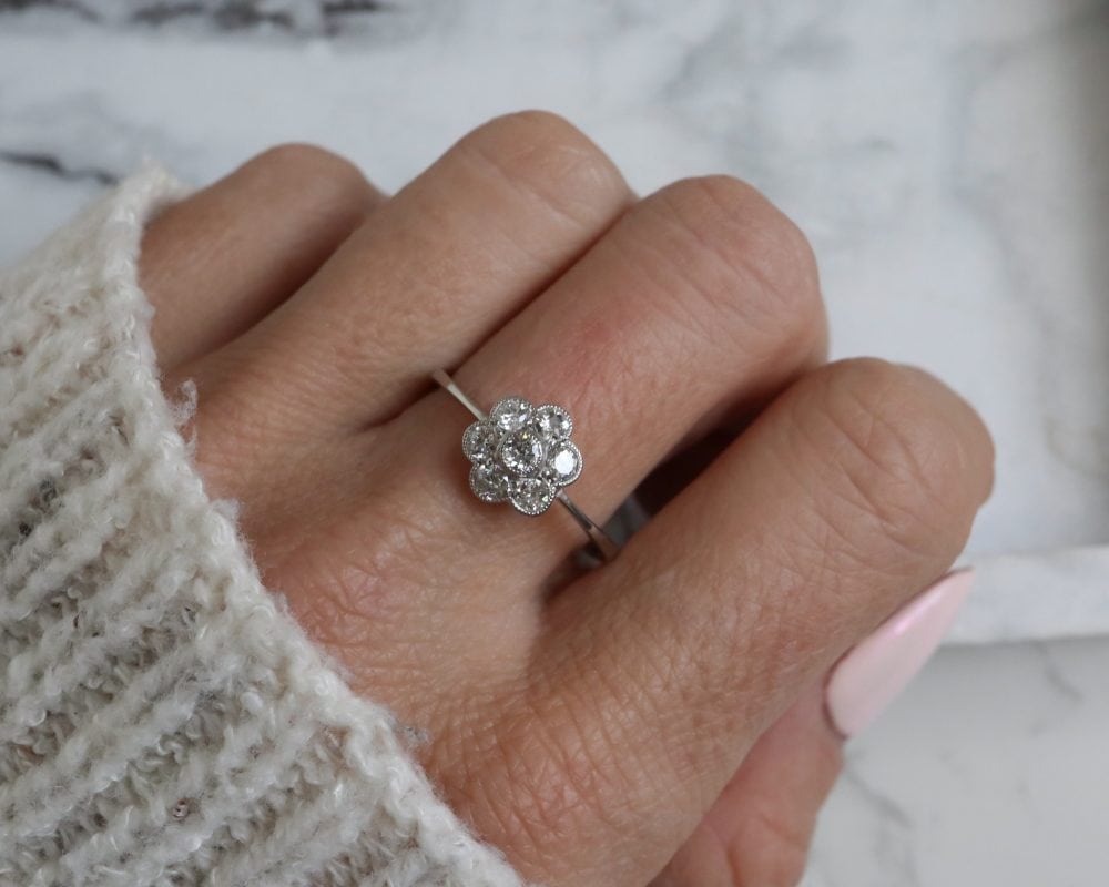 Antique Edwardian diamond daisy ring set in 18ct white gold for sale in Leeds, Yorkshire
